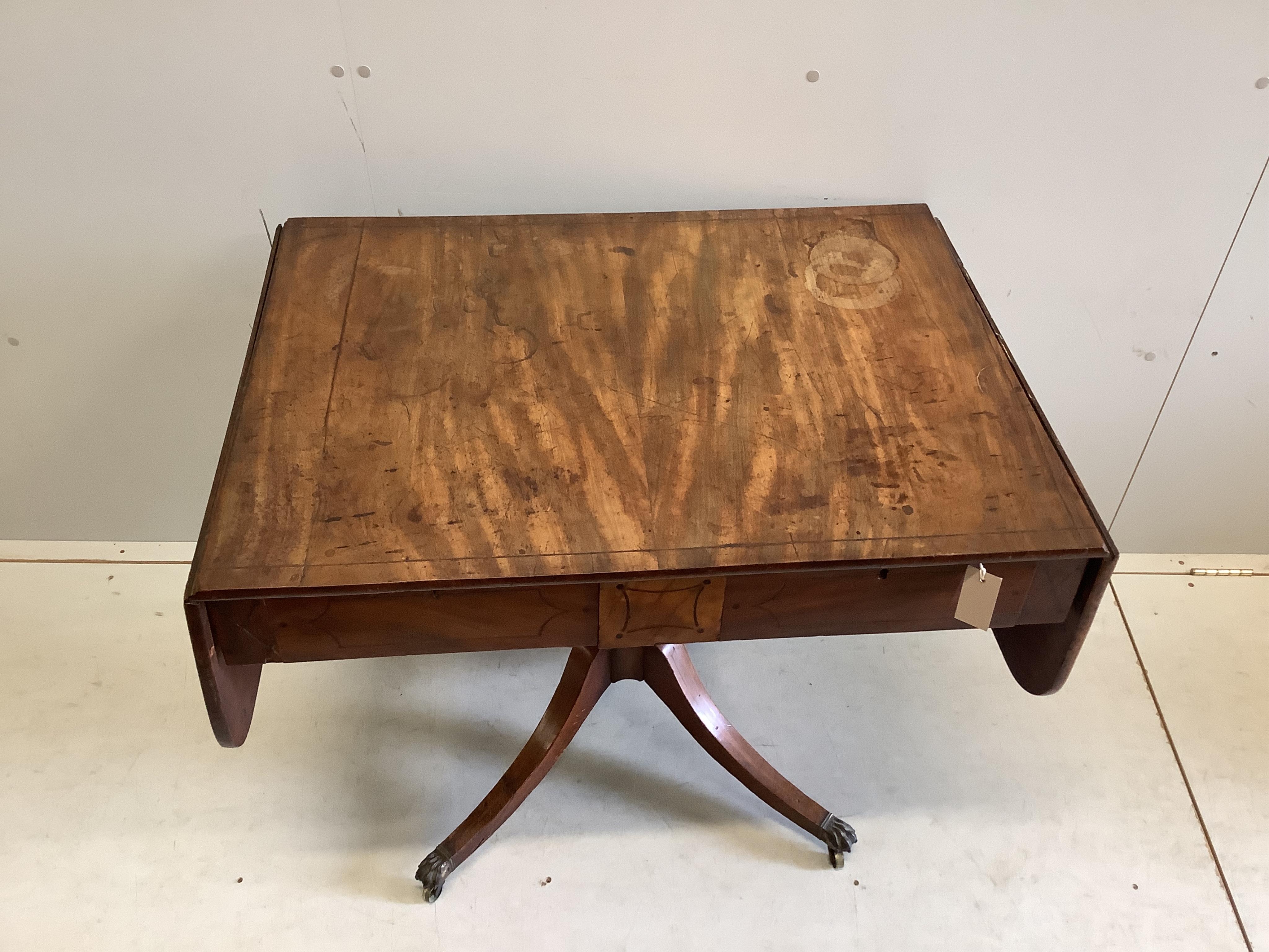 A Regency mahogany sofa table, width 90cm, depth 65cm, height 73cm. Condition - poor to fair